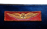 NZCAA Pilot Logbook Cover - wrap closure, 2 colour outside / inside, carved wings /embossed initials